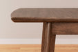 Lyncott Dining Extension Table - Imperial Furniture (Las Vegas, NV) - Multi Location
