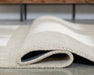 Wolbert 7'8" x 10' Area Rug - Imperial Furniture (Las Vegas, NV) - Multi Location